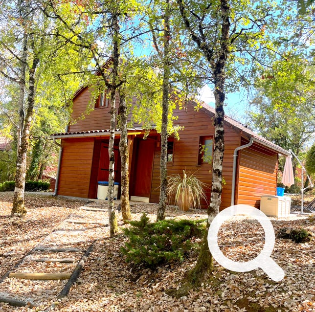 Vue extérieur de la maison Orchidée 14, Charmante maison en bois  au coeur du Golf de Souillac - Lachapelle Auzac, proche Sarlat est des plus grands sites touristiques de la Dordogne et du Lot